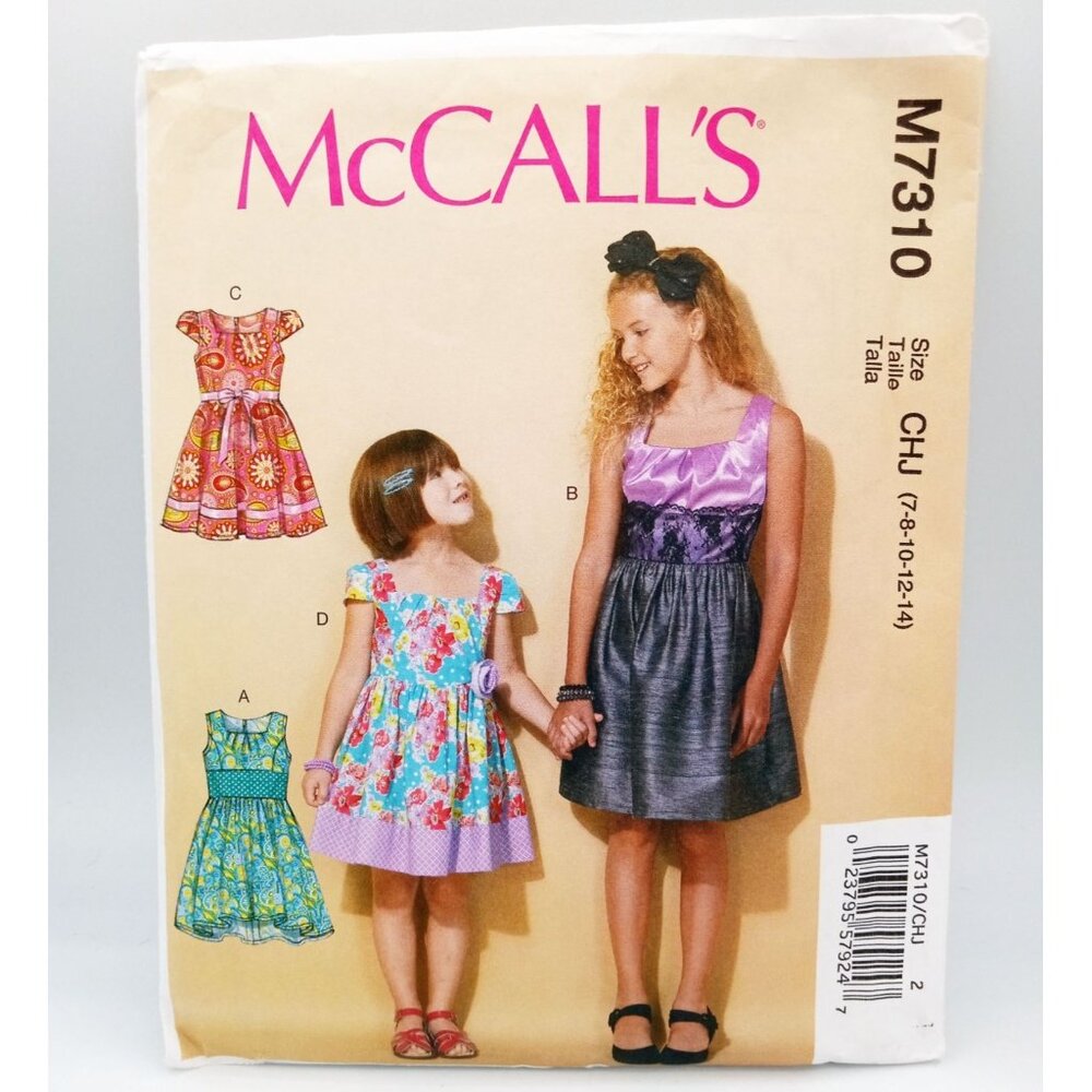McCalls Pattern M7310 CHJ Sz 7,8,10,12,14 Children and Girls Dresses Uncut